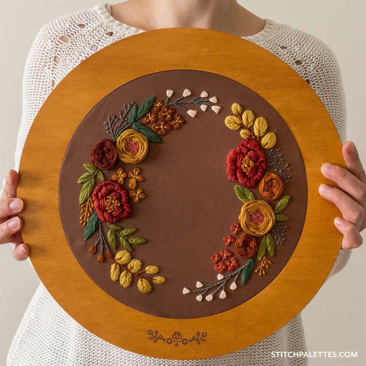 Fall Florals finished embroidery hoop on a dark background